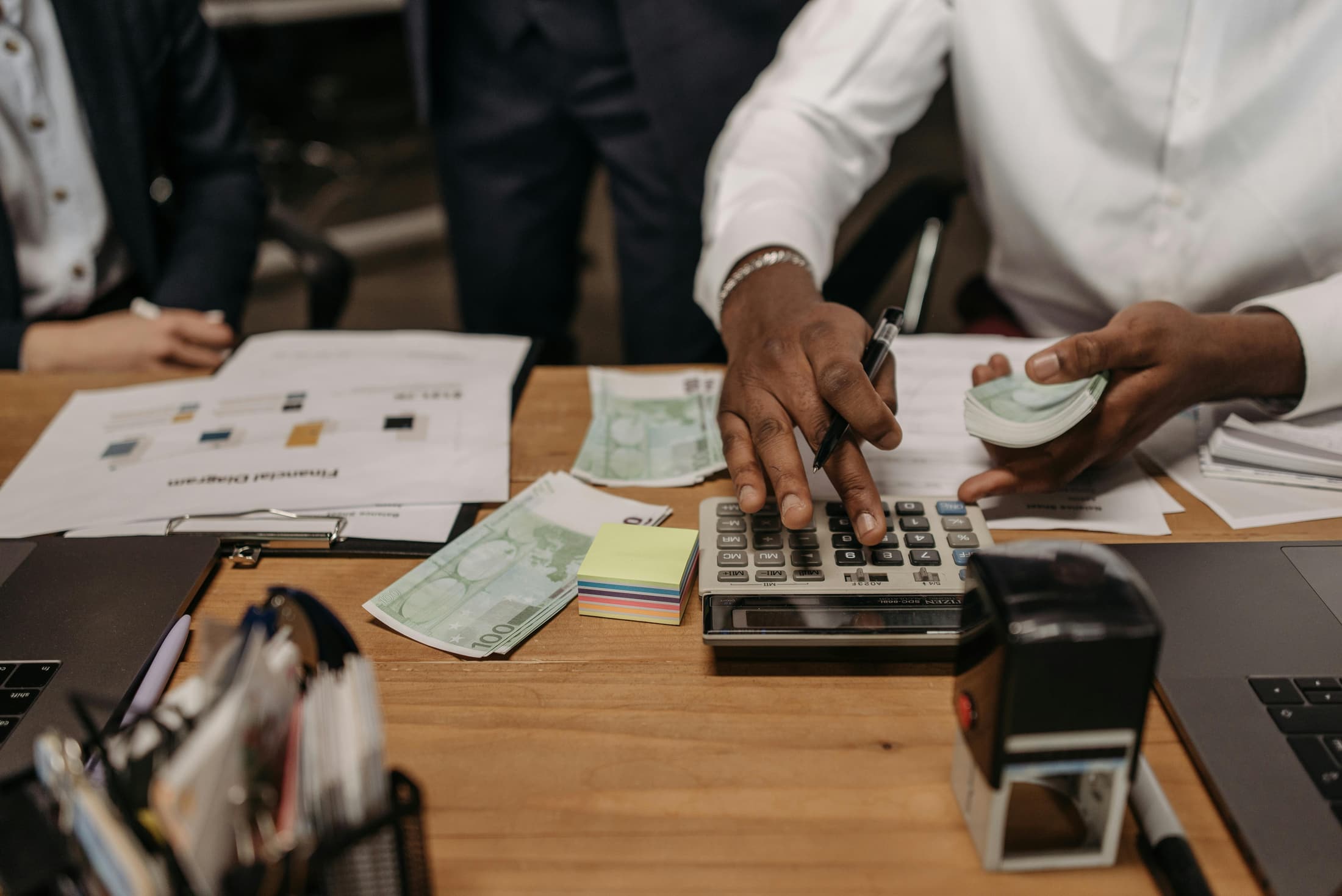 Startup founders reviewing financing documents